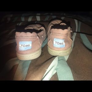 Toddler plum color Toms Size 7.